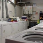 Laundry room for volunteers at Camp Restore New Orleans